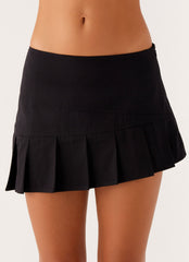 Tilda Asymmetric Pleated Mini Skirt